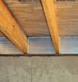 SilverGlo™ insulation installed in a floor joist in Bay Bulls