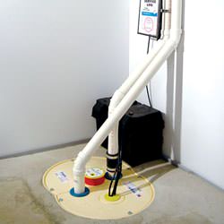 A complete sump pump and battery backup system installed in a home in Spaniards Bay